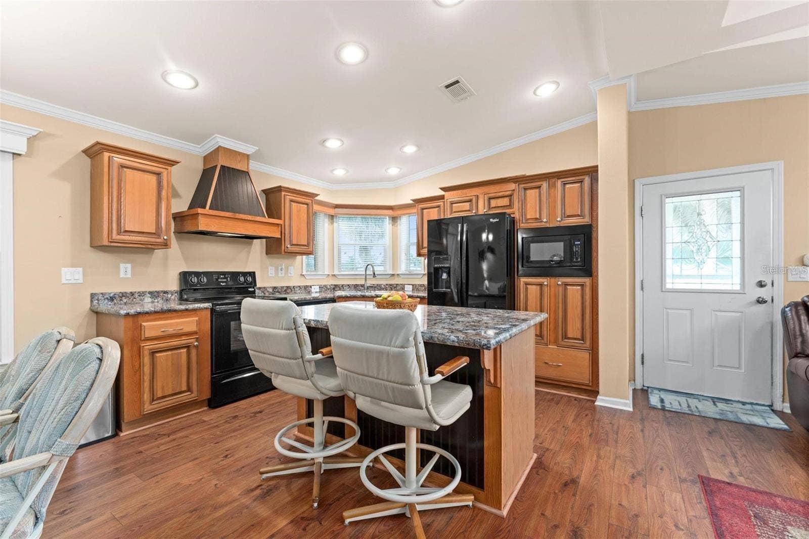 2417 VINDALE ROAD, Tavares, FL 32778 Kitchen island with bar seating