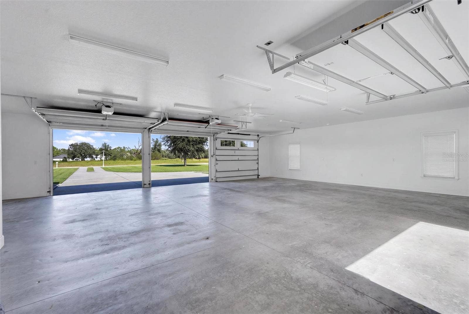 6100 OCILLA LOOP, Clermont, FL 34714 Garage - VIRTUALLY STAGED