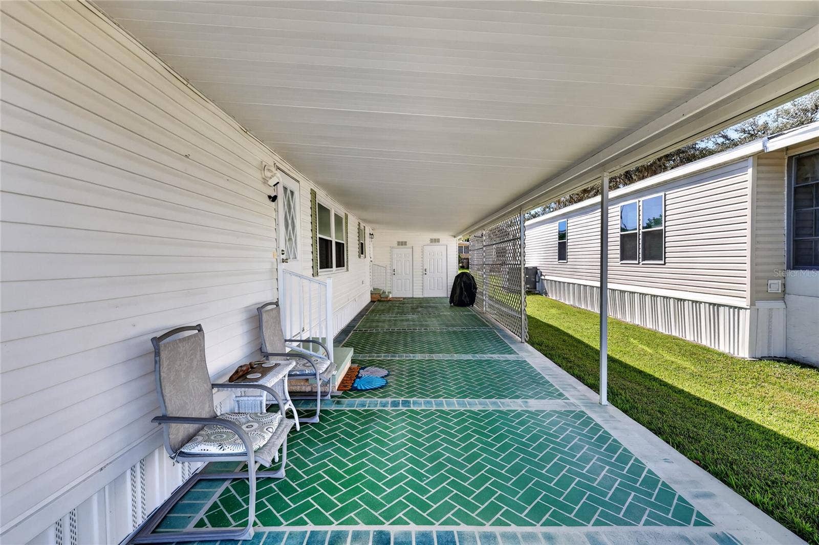 565 TAMMI DRIVE, Leesburg, FL 34788 Carport/entrance to Home