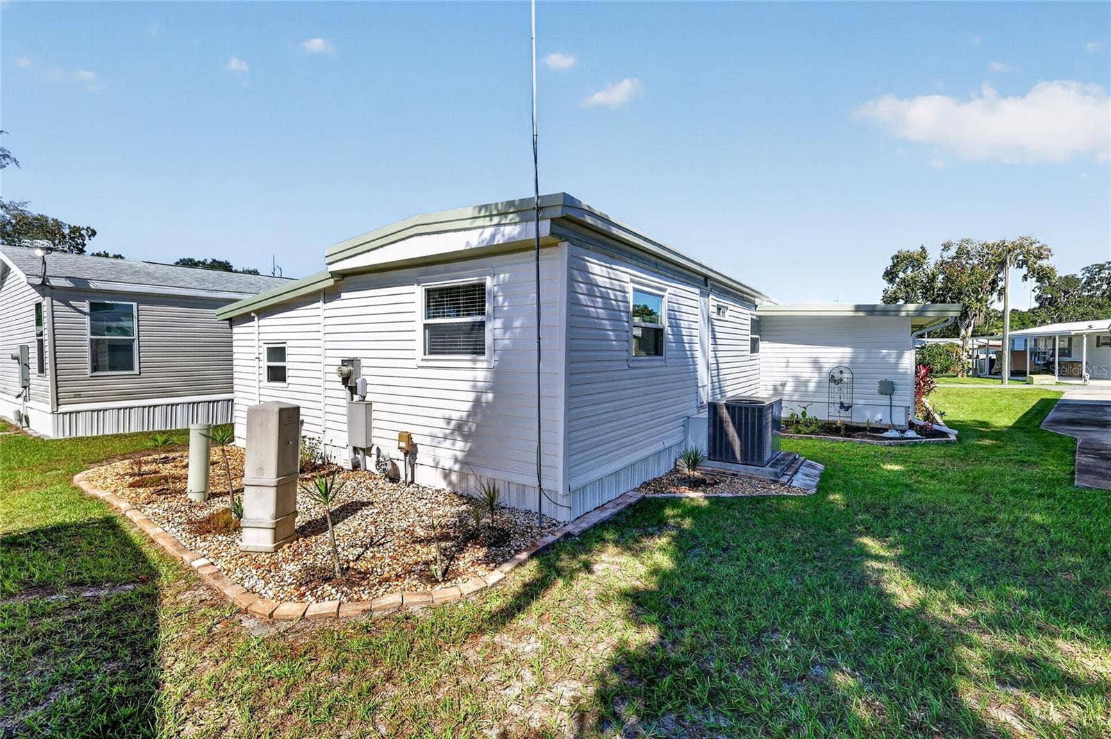565 TAMMI DRIVE, Leesburg, FL 34788 Rear/Side Elevation