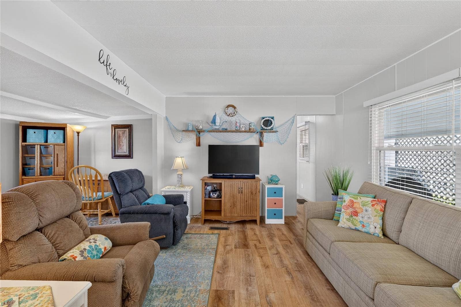 565 TAMMI DRIVE, Leesburg, FL 34788 Living room view #2
