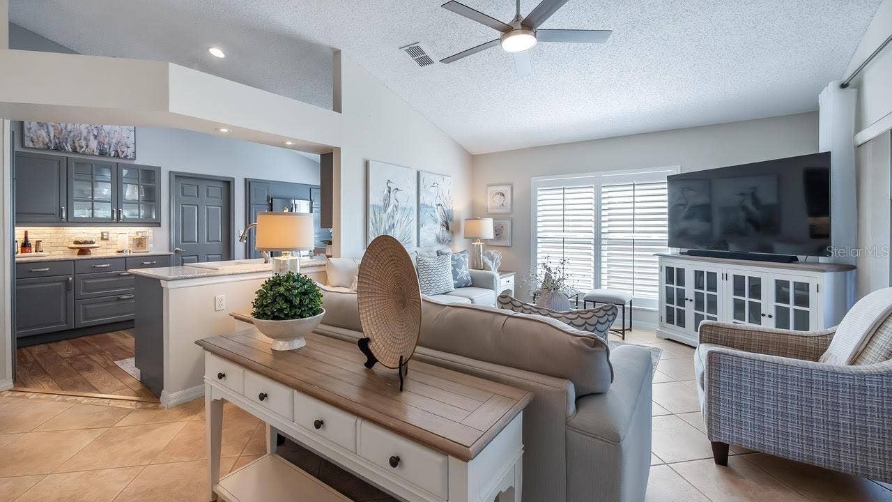 3720 DOUNE WAY, Clermont, FL 34711 Living Room and Kitchen