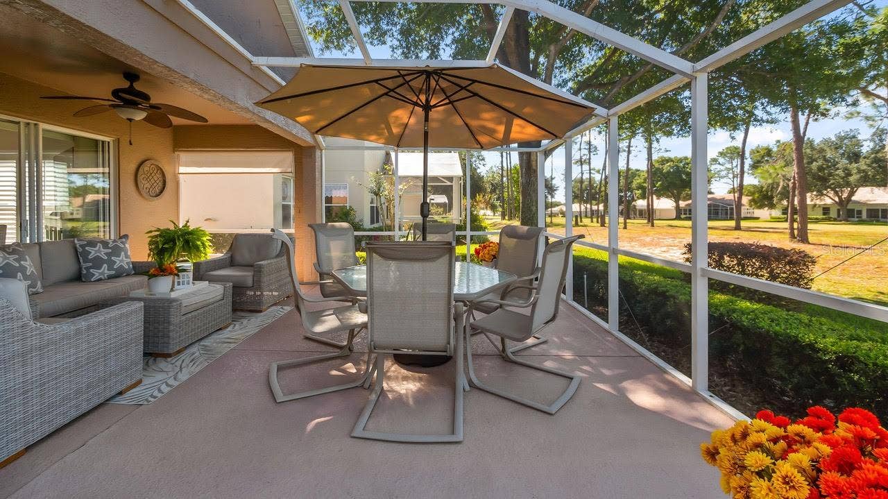 3720 DOUNE WAY, Clermont, FL 34711 Eating Area Overlooking the Lanai