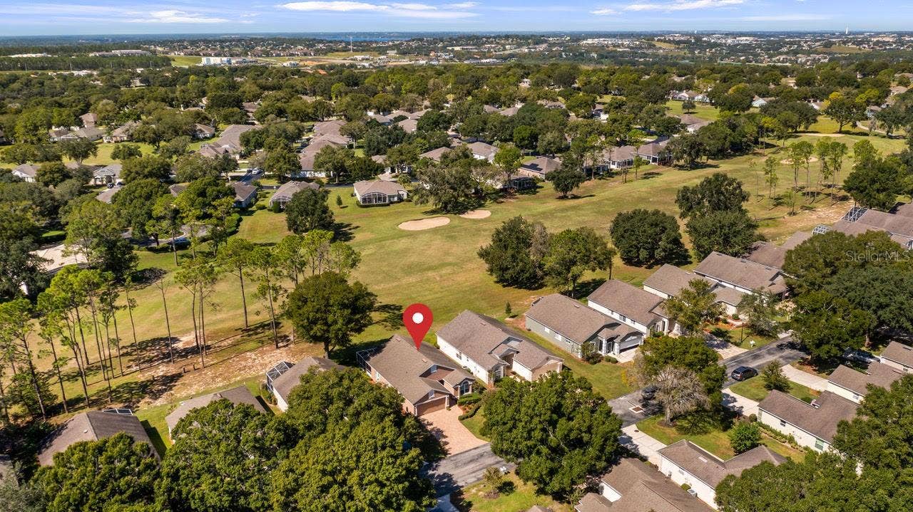 3720 DOUNE WAY, Clermont, FL 34711 Drone of Golf Course