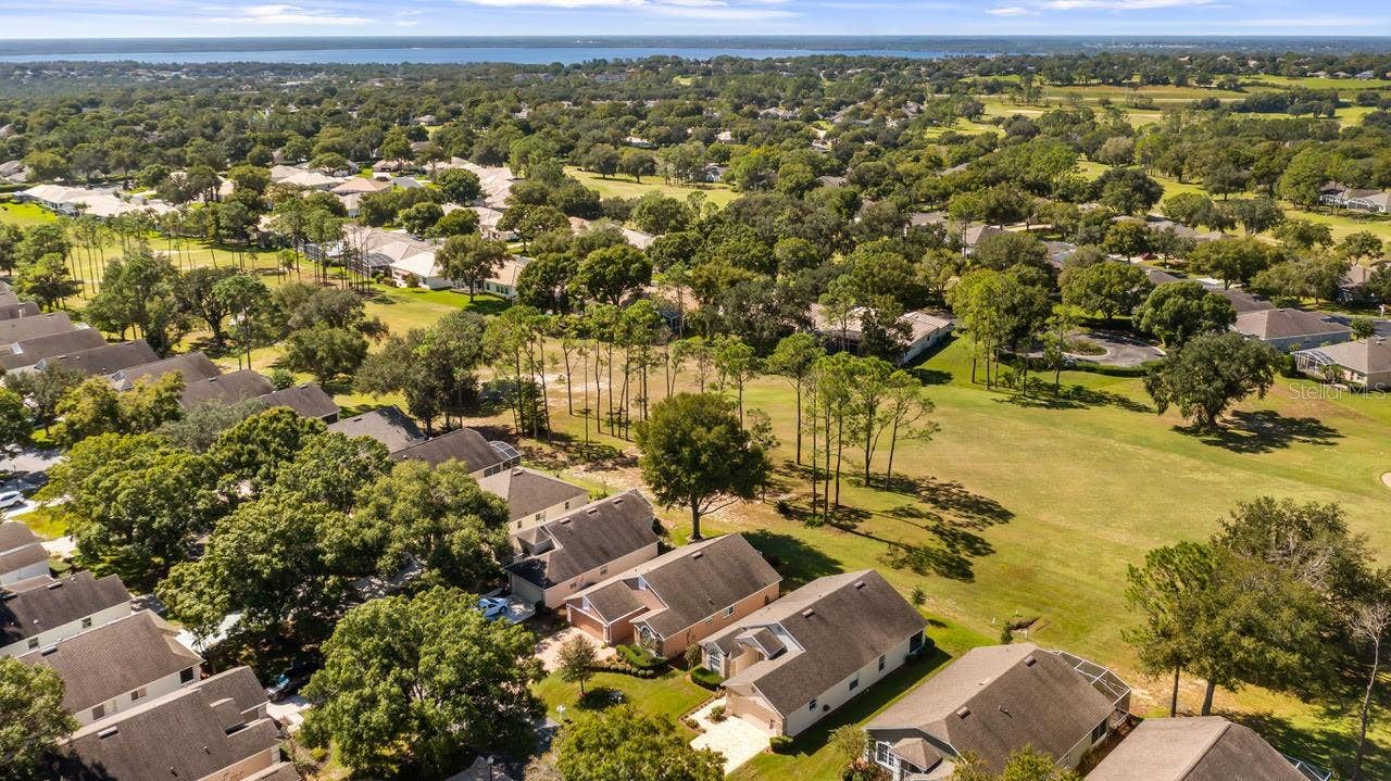 3720 DOUNE WAY, Clermont, FL 34711 Drone of Golf Course