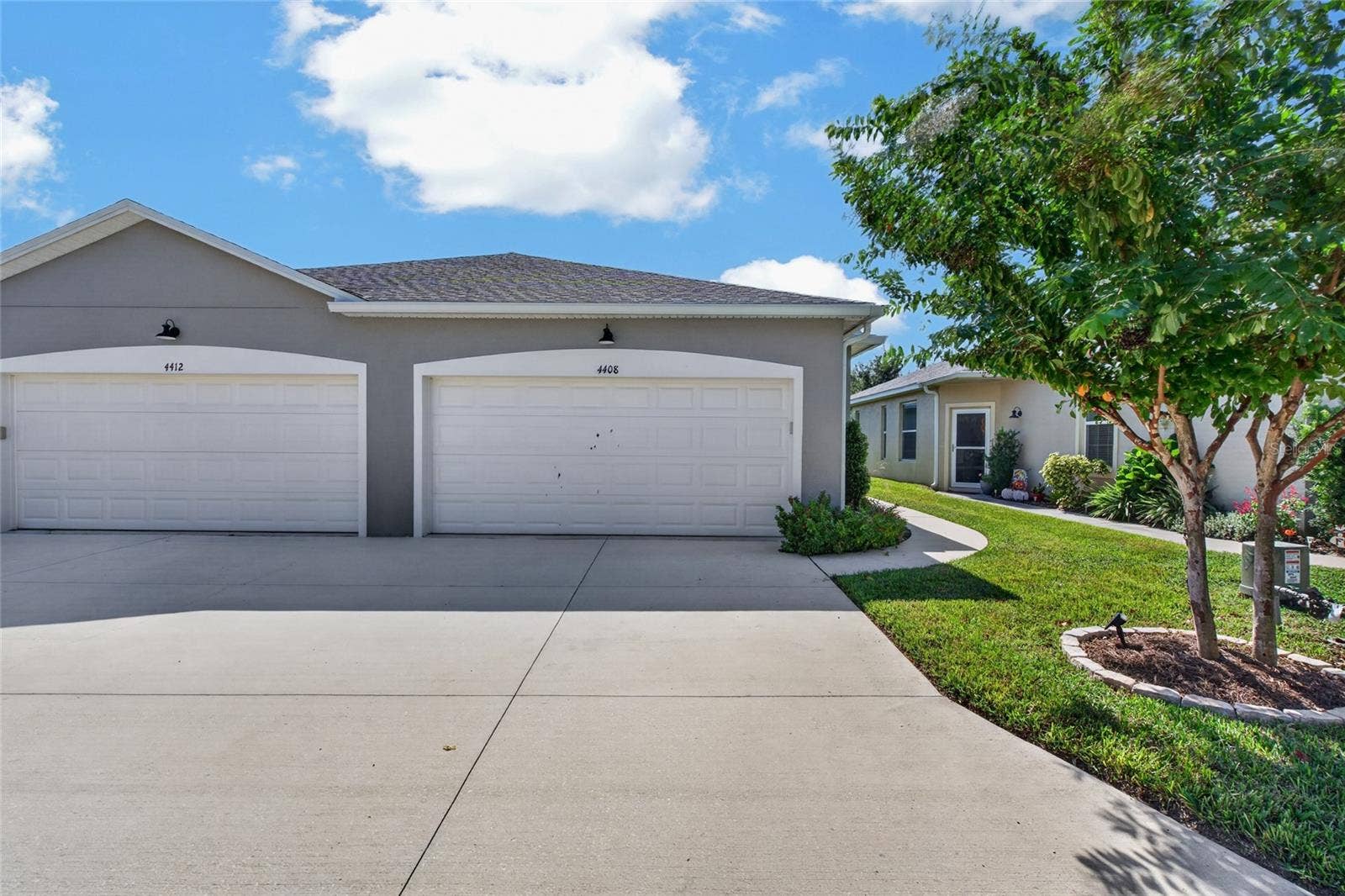 4408 BEDFORD WAY, Leesburg, FL 34748 Villa is on the right