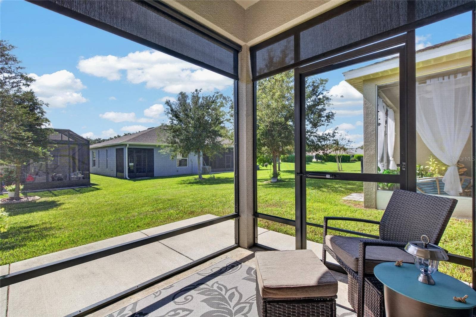 4408 BEDFORD WAY, Leesburg, FL 34748 Screen lanai with roller sun shades