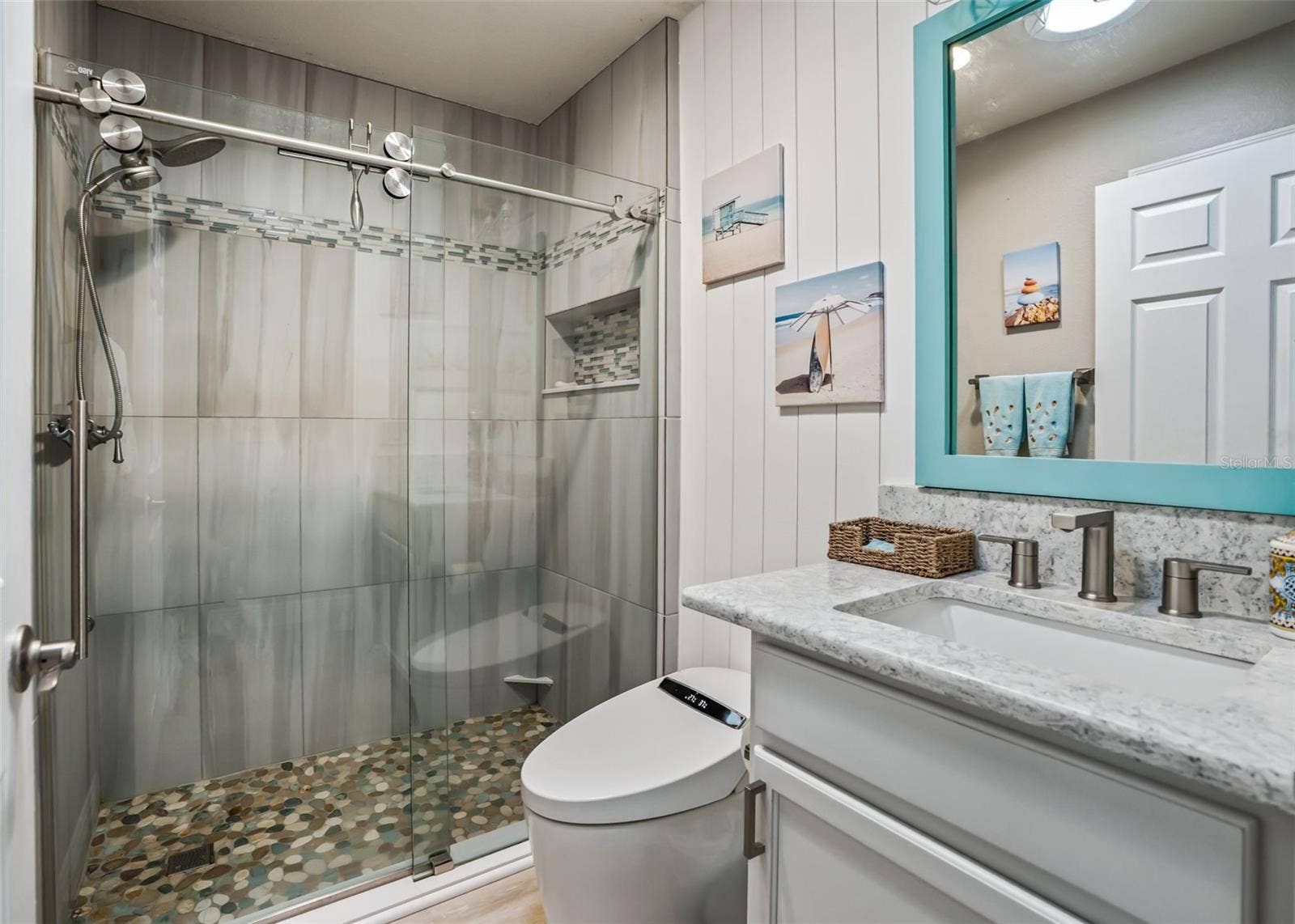 3229 DRESSENDORFER DRIVE, The Villages, FL 32163 Guest Bath. Toilet seat lifts when you. Quartz Countertops. enter the room.