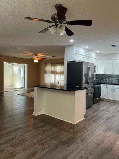 2368 CONESTOGA DRIVE, Leesburg, FL 34748 Open concept with views of Kitchen, Living area, Florida Room and entryway.