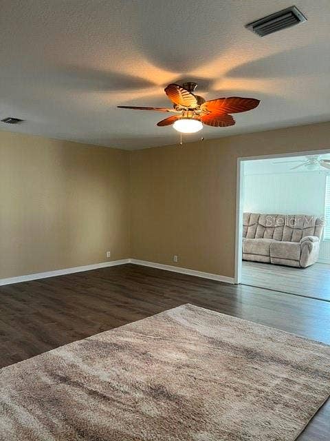2368 CONESTOGA DRIVE, Leesburg, FL 34748 Large Living Room with view of Florida Room.