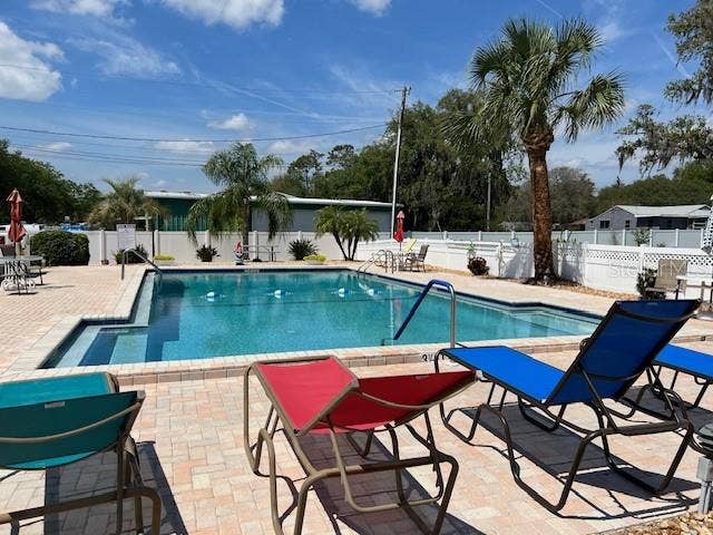 2368 CONESTOGA DRIVE, Leesburg, FL 34748 Bright and Sunny Large heated pool