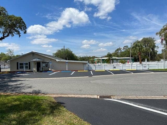 2368 CONESTOGA DRIVE, Leesburg, FL 34748 Larger View of Club house, pool area and parking.