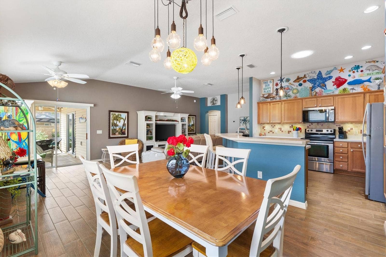 2398 FLATWOOD STREET, The Villages, FL 32162 DINING ROOM OPEN FLOOR PLAN
