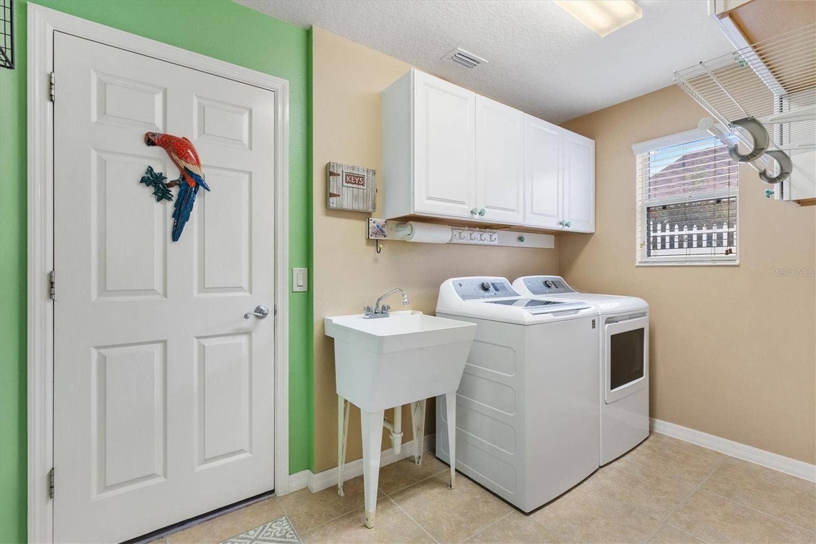 2398 FLATWOOD STREET, The Villages, FL 32162 LAUNDRY ROOM INSIDE
