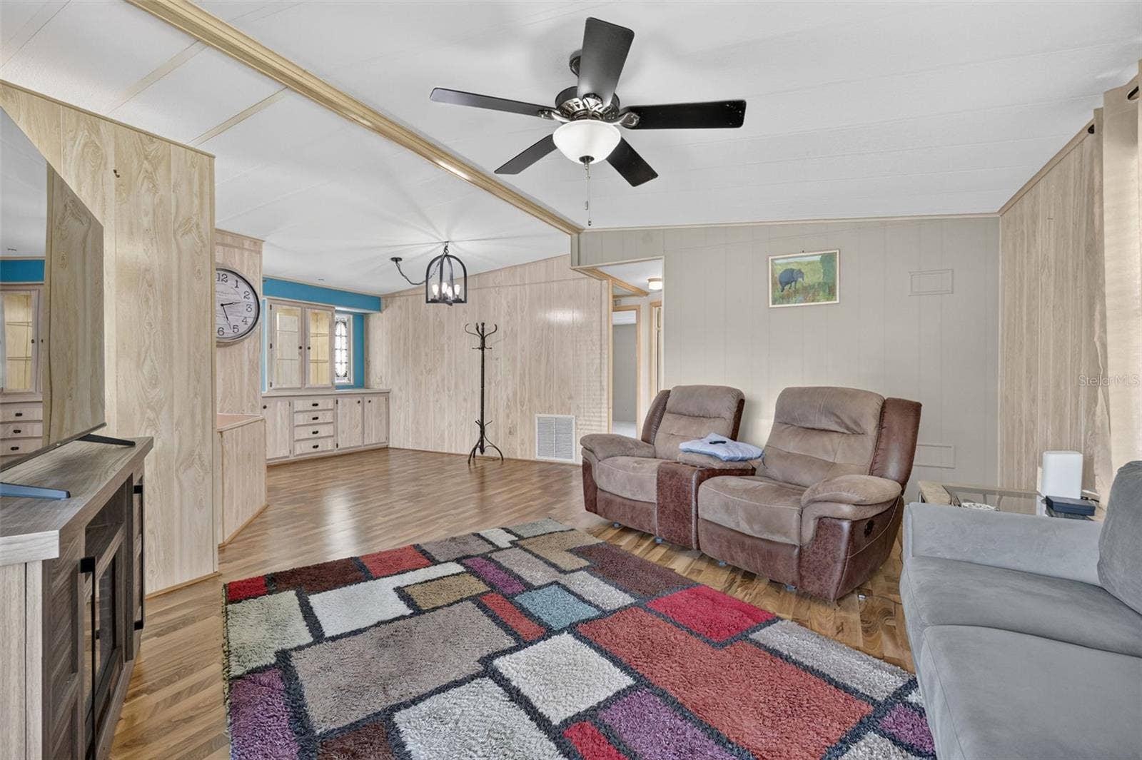 2005 STACEY DR, Mount Dora, FL 32757 Living Room flows into the Dining area