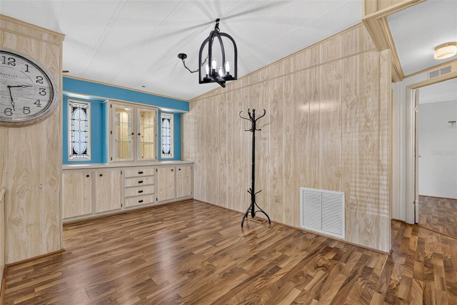 2005 STACEY DR, Mount Dora, FL 32757 Dining Area with Built in cabinets with lights