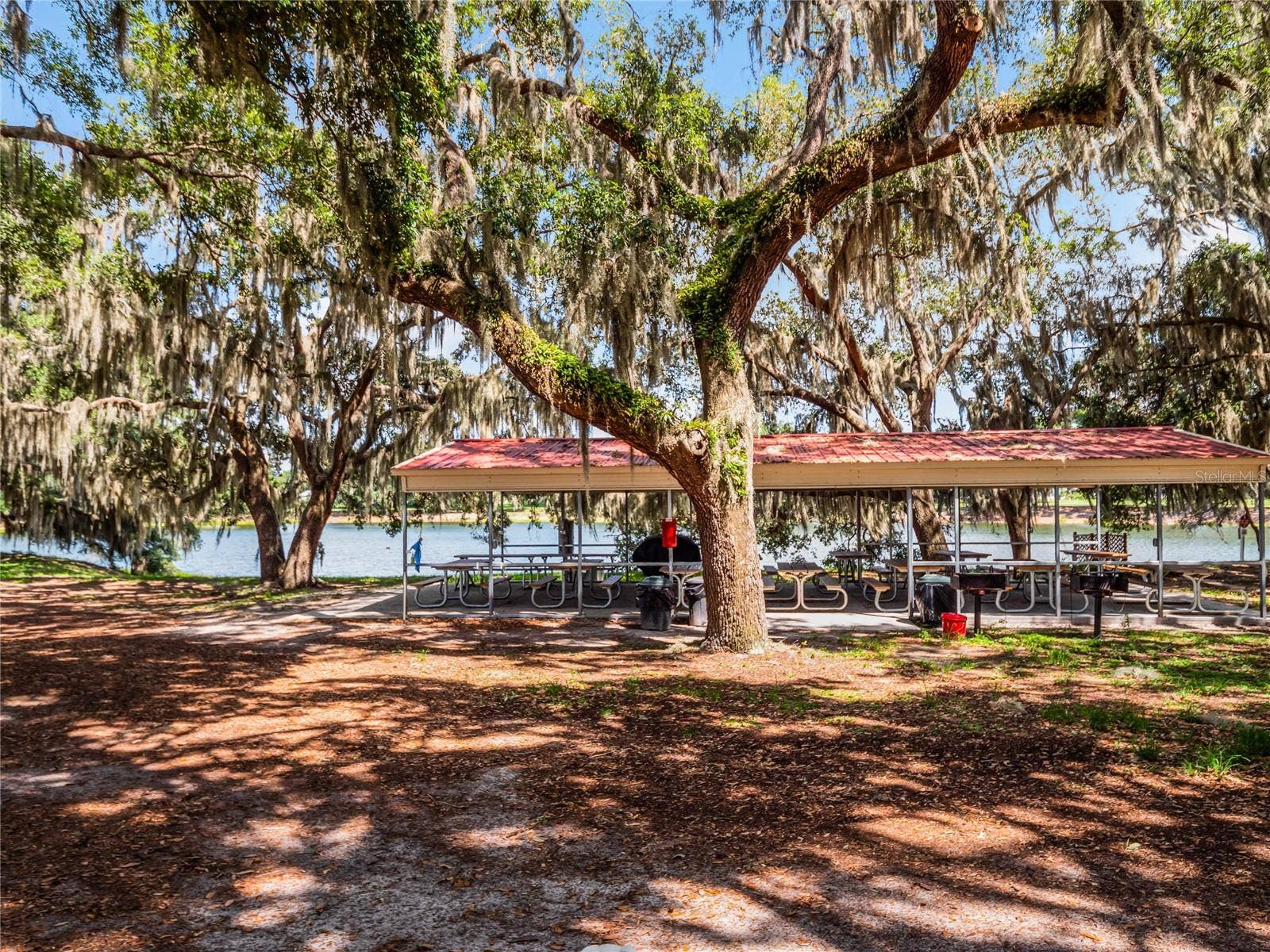 Picnic pavilion over-looking one of four catch & release lakes within the community; Lake Evert