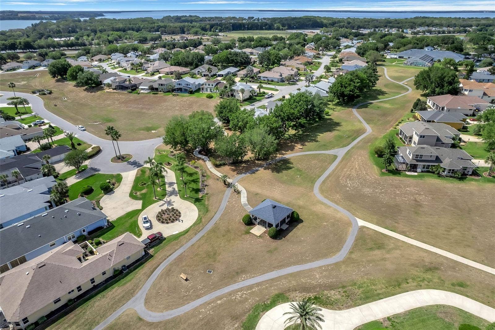 4900 CANOE COURT, Tavares, FL 32778 Walking and golf cart paths through the commons green space.