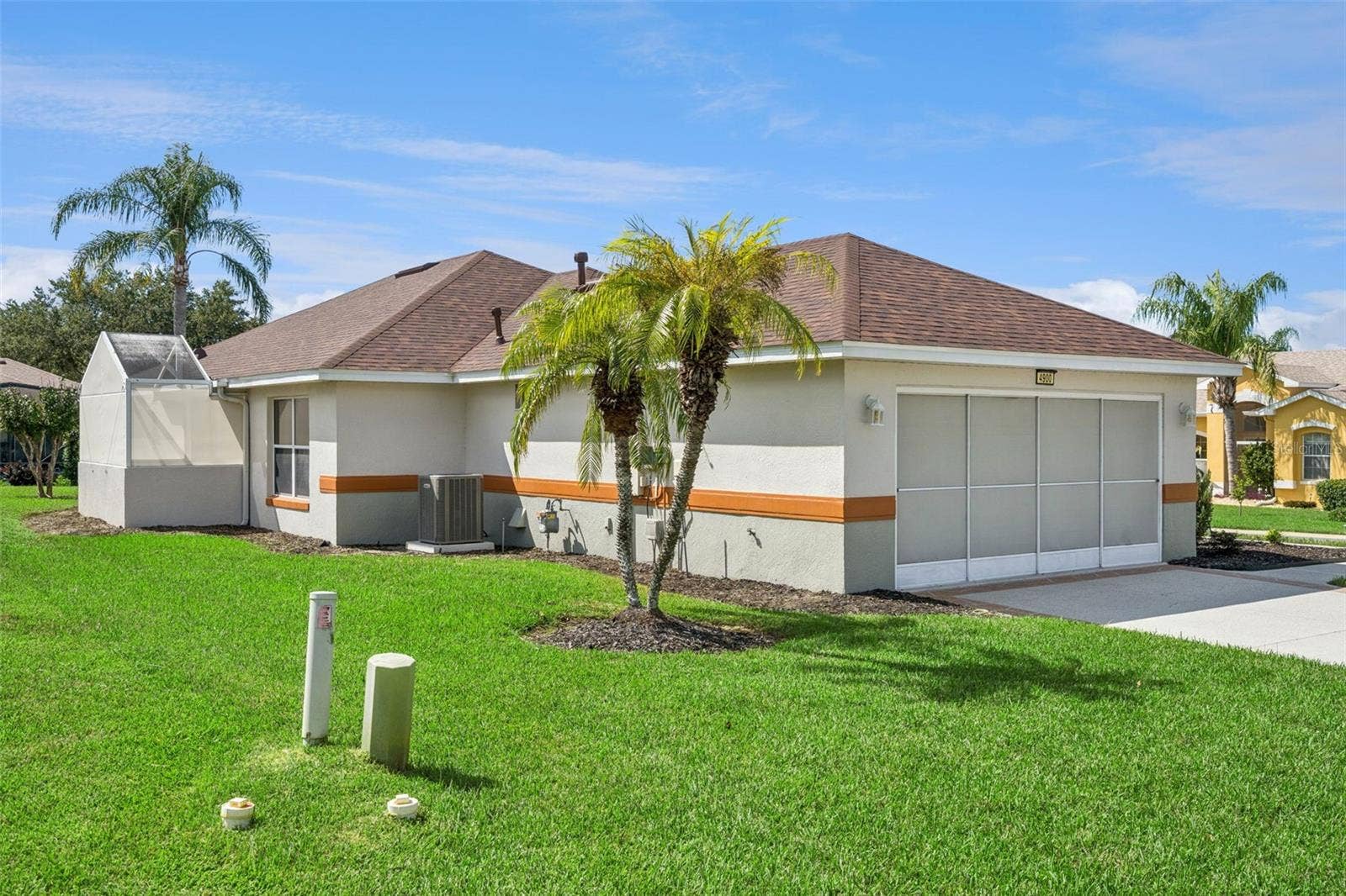 4900 CANOE COURT, Tavares, FL 32778 Back yard from the garage side of the home.