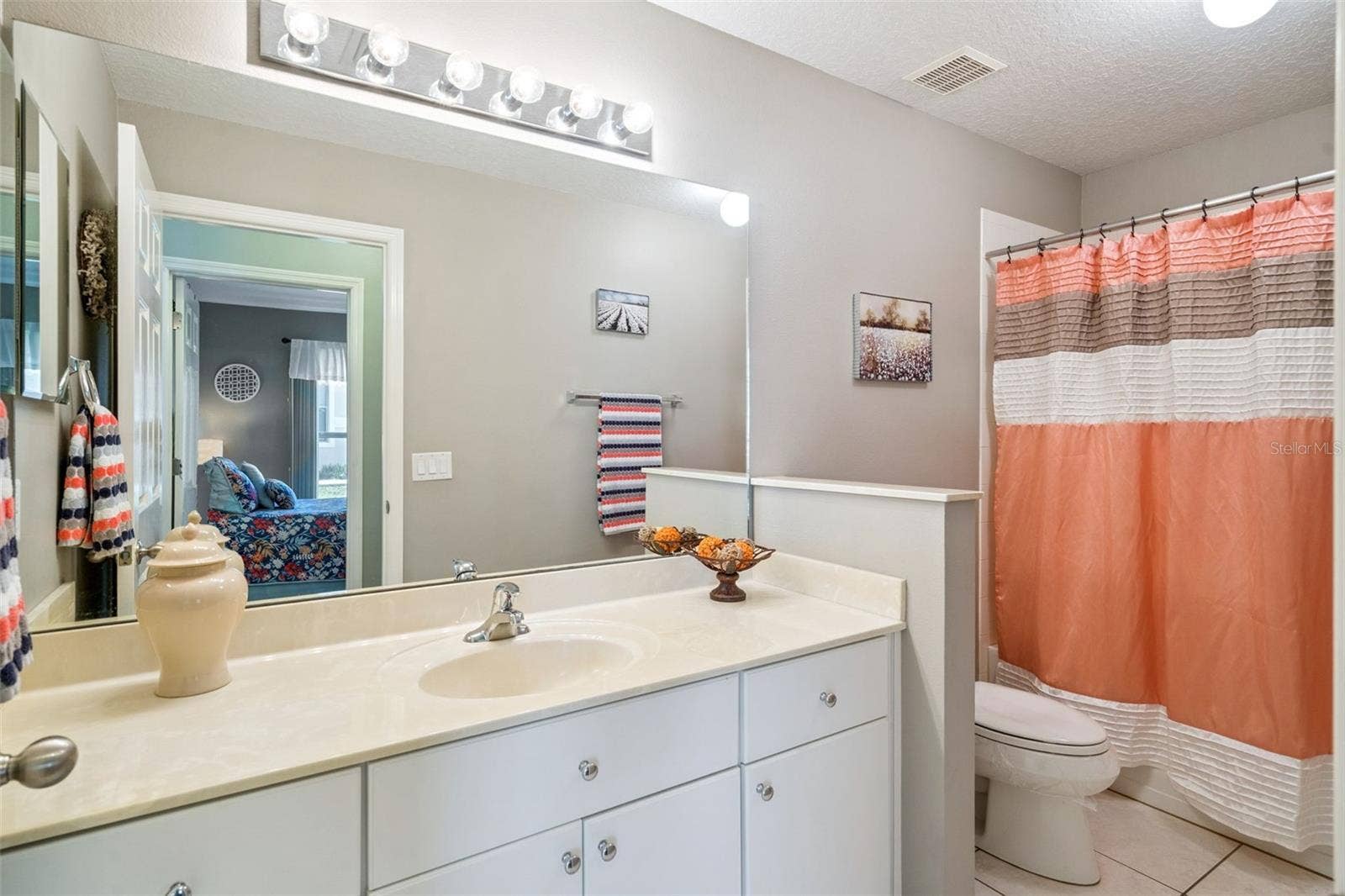 4900 CANOE COURT, Tavares, FL 32778 2nd full bath with spacious vanity and tub/shower.