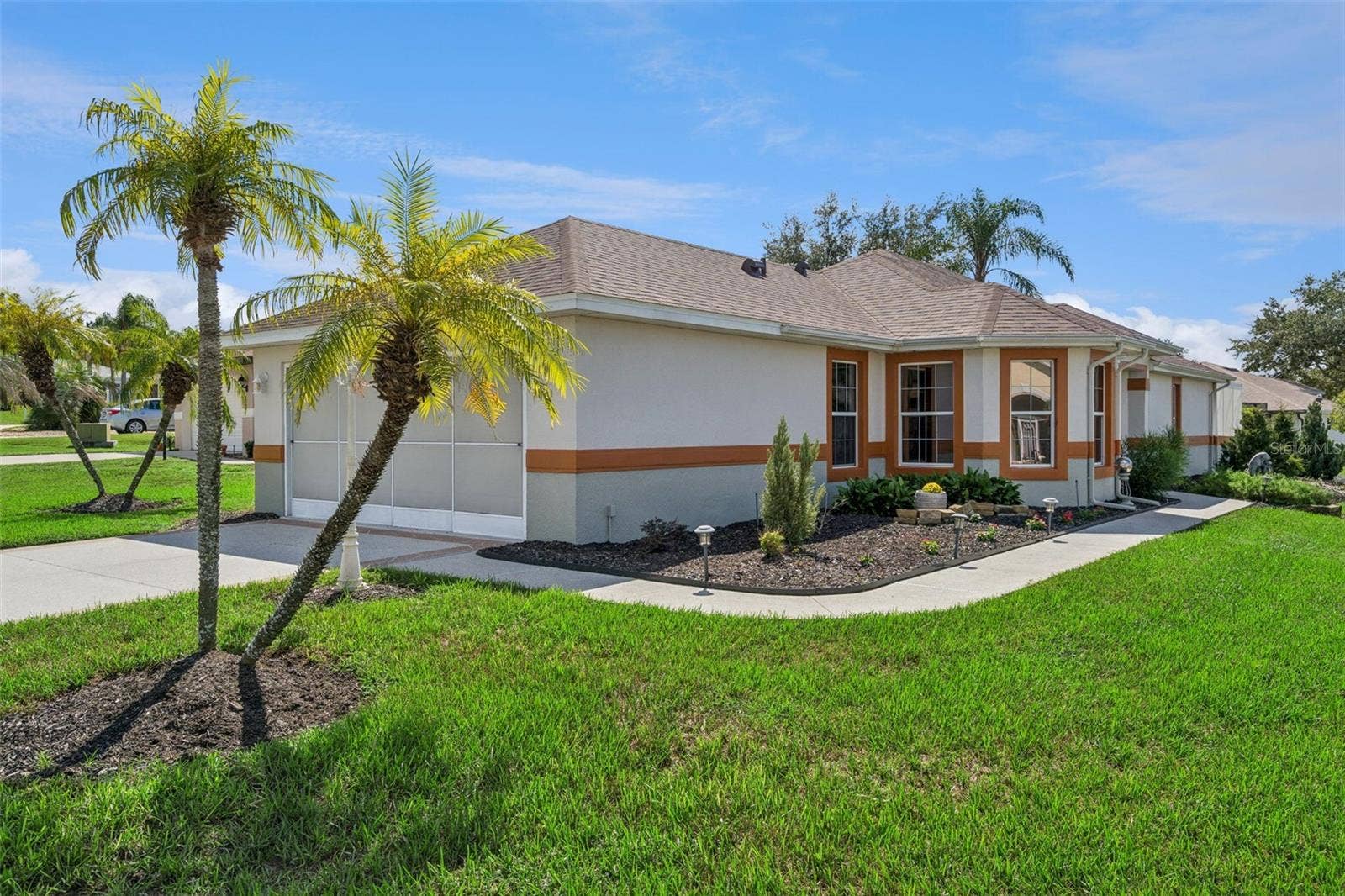 4900 CANOE COURT, Tavares, FL 32778 The Front faces Seven Seas Dr, with the driveway entrance from Canoe Ct.