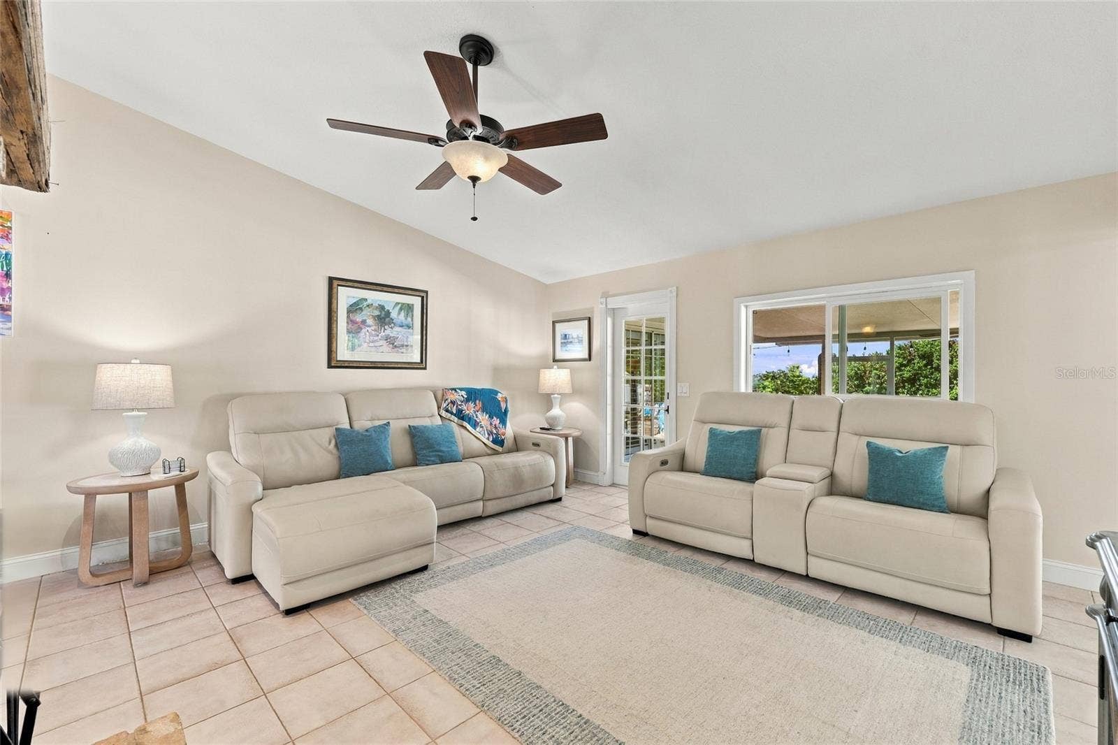 13205 MARIA AVENUE, Clermont, FL 34711 Family room with door to lanai