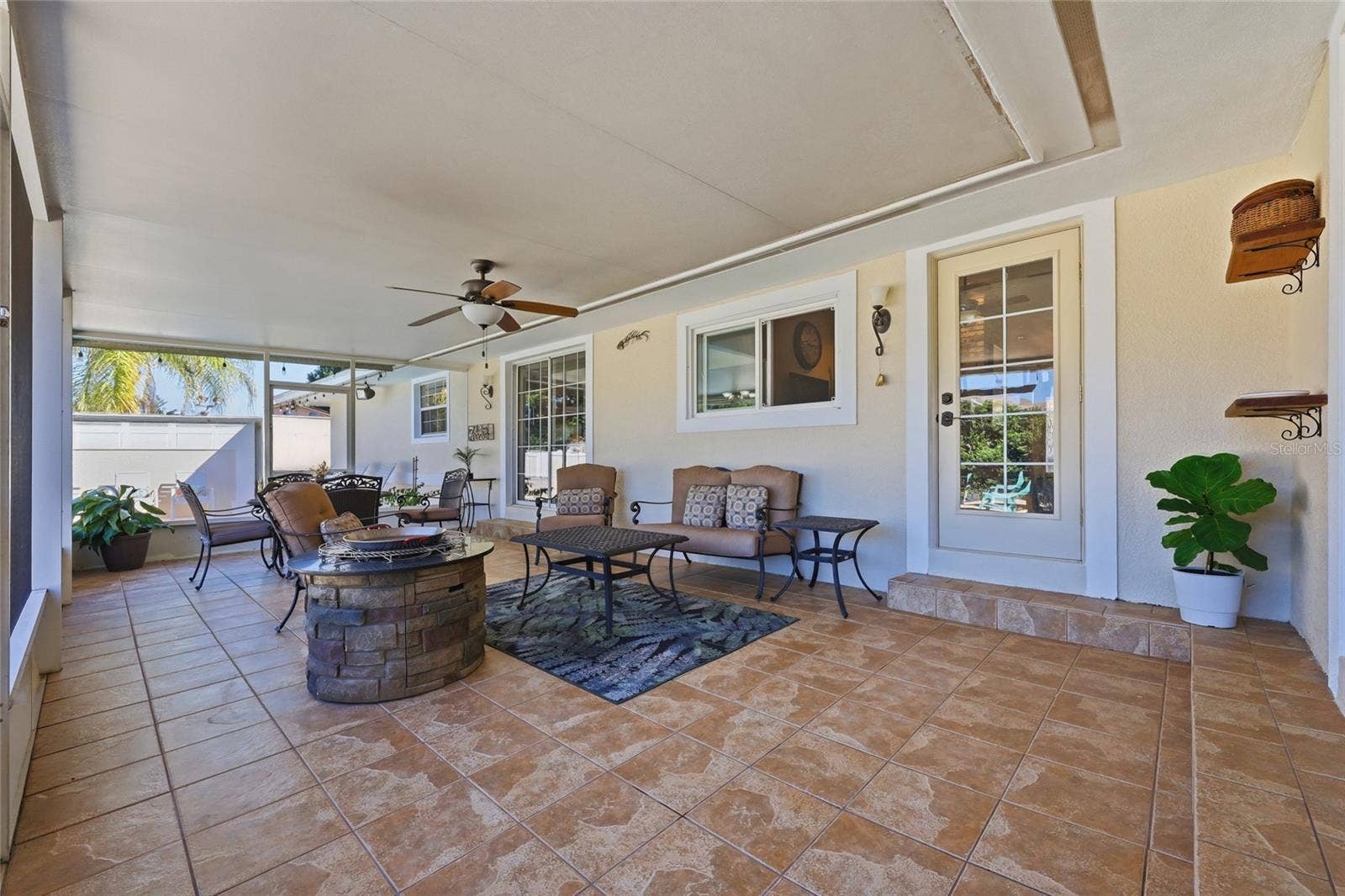 13205 MARIA AVENUE, Clermont, FL 34711 Large tiled & screened in lanai