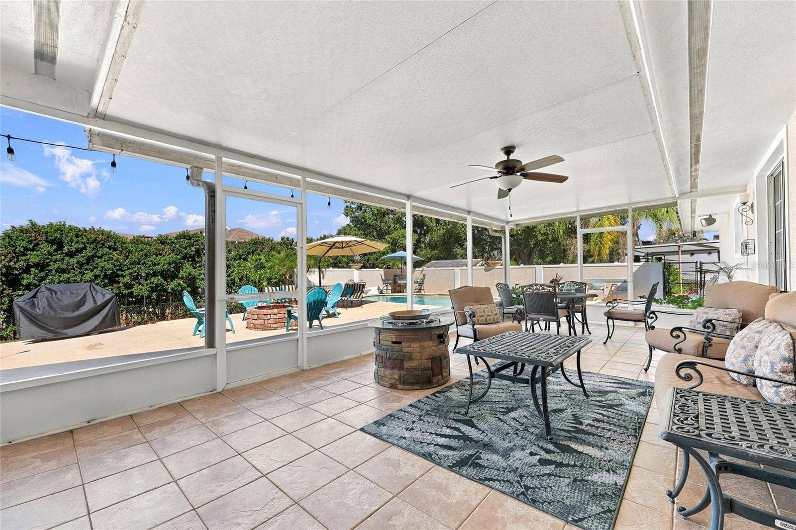 13205 MARIA AVENUE, Clermont, FL 34711 Large tiled & screened in lanai