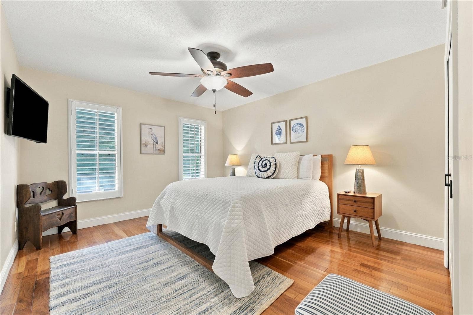 13205 MARIA AVENUE, Clermont, FL 34711 2nd guest bedroom with teak engineered floors & plantation shutters