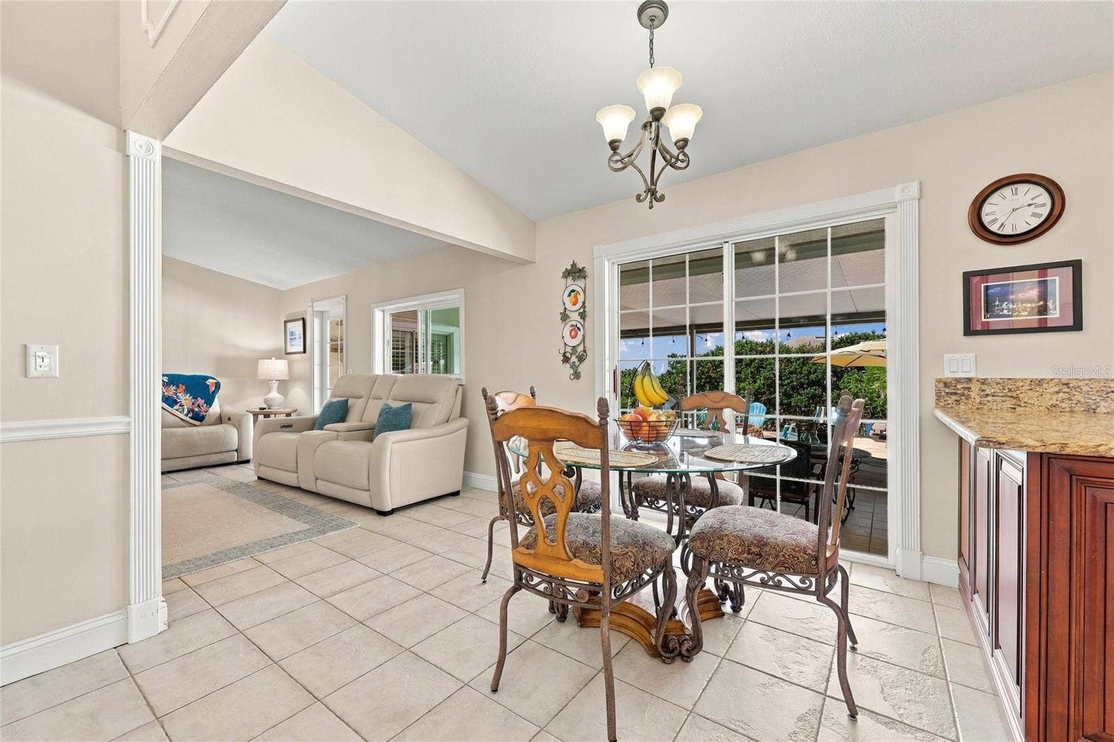 13205 MARIA AVENUE, Clermont, FL 34711 Eat in kitchen area with sliders to lanai