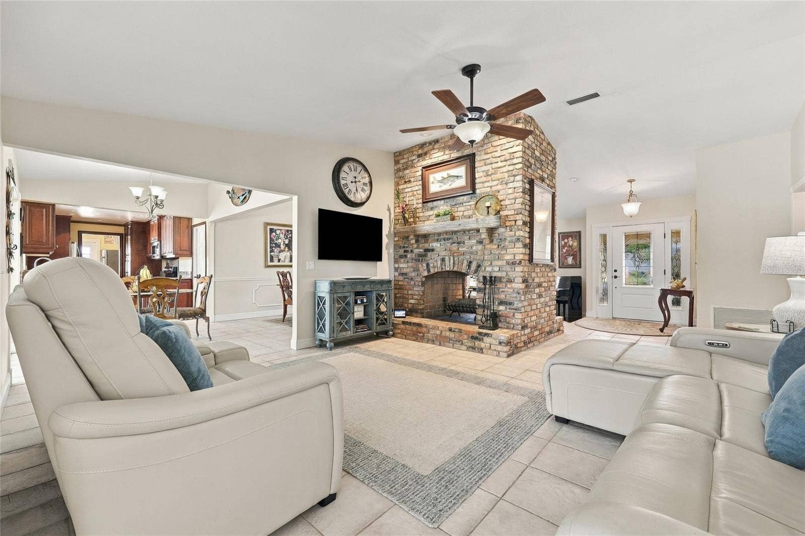 13205 MARIA AVENUE, Clermont, FL 34711 Family room with tile floor