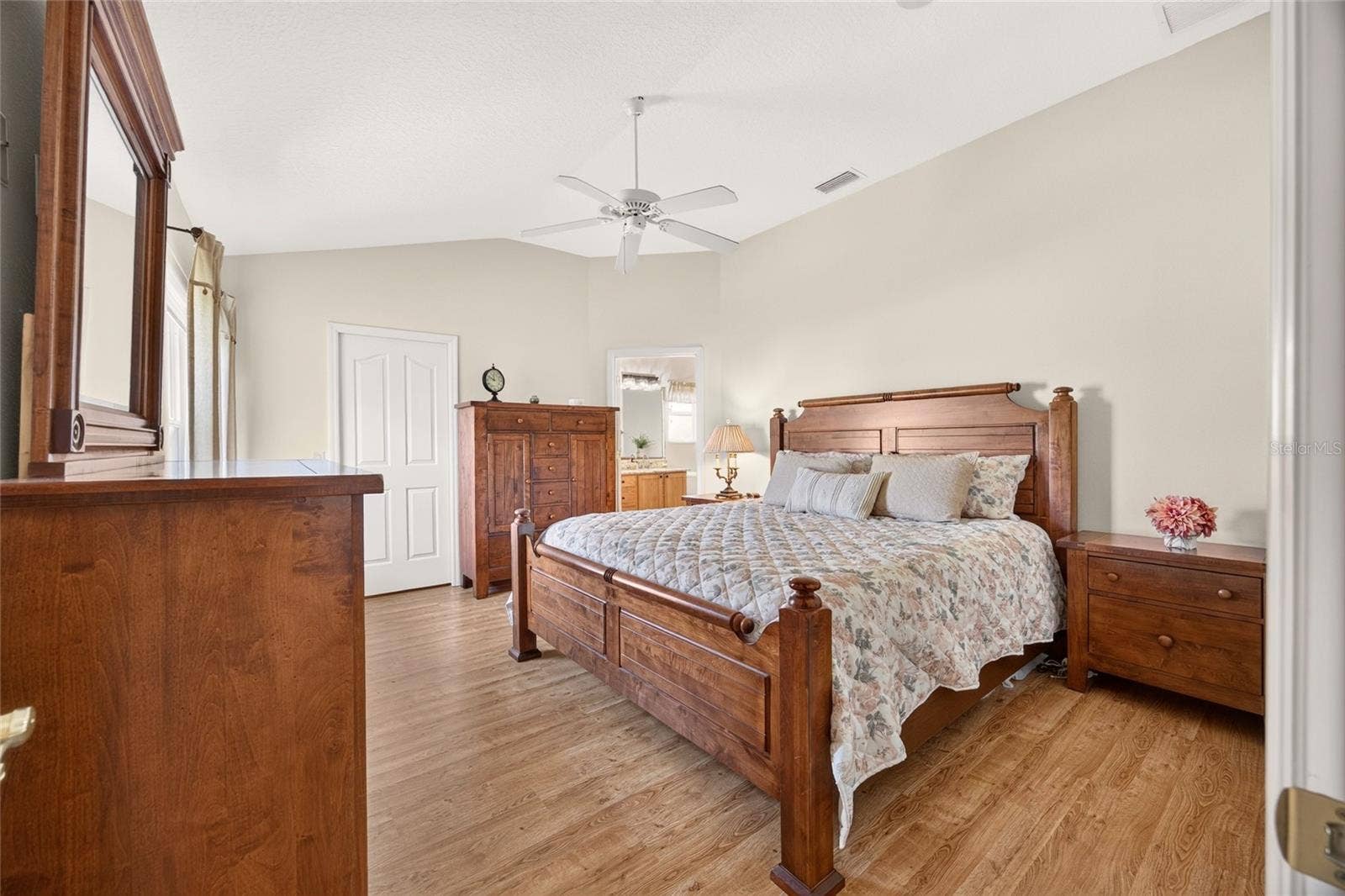 17942 SE 88TH CASCADE COURT, The Villages, FL 32162 The primary bedroom offers a comfortable retreata welcoming space to unwind and recharge at the end of the day.