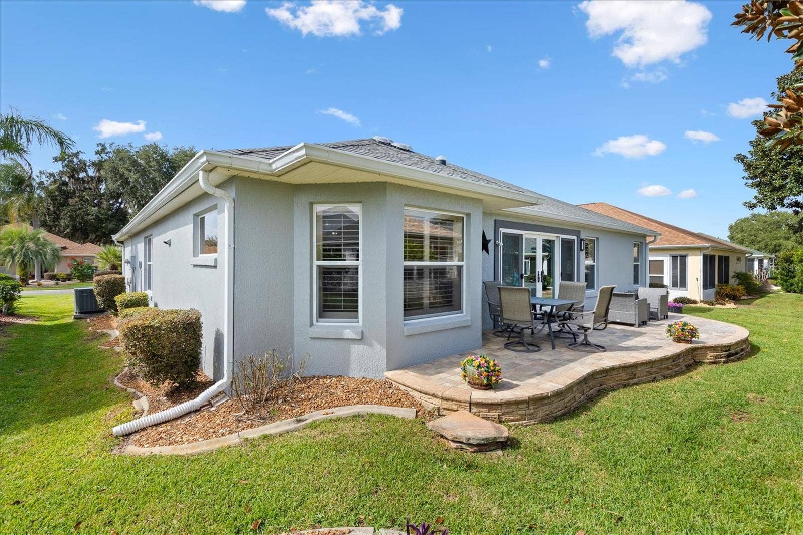 7146 SE 173RD ARLINGTON LOOP, #62, The Villages, FL 32162 Gutters and downspouts all the way around the home