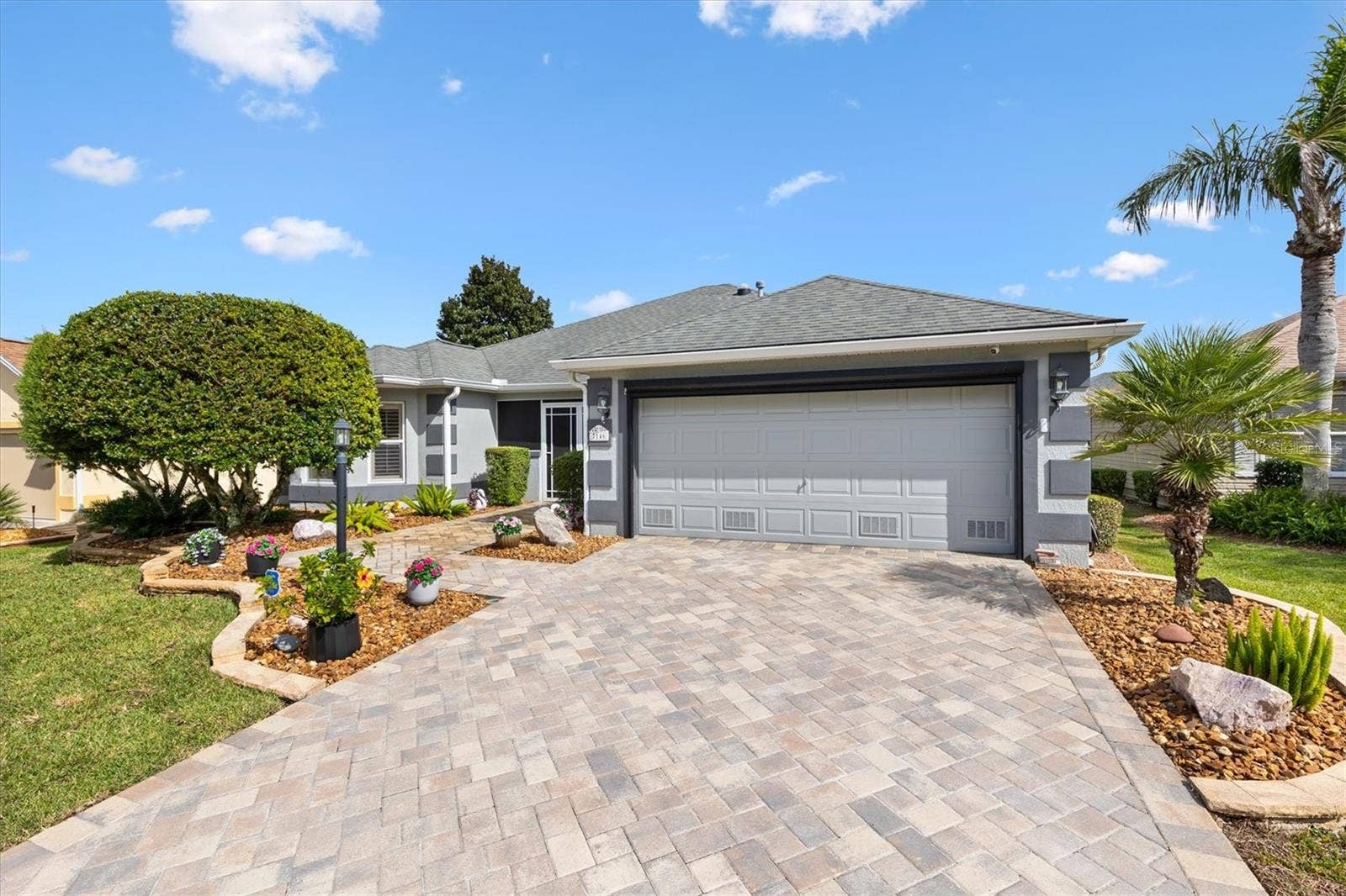 7146 SE 173RD ARLINGTON LOOP, #62, The Villages, FL 32162 Upgraded landscaping, Pavers driveway, electric garage screen.