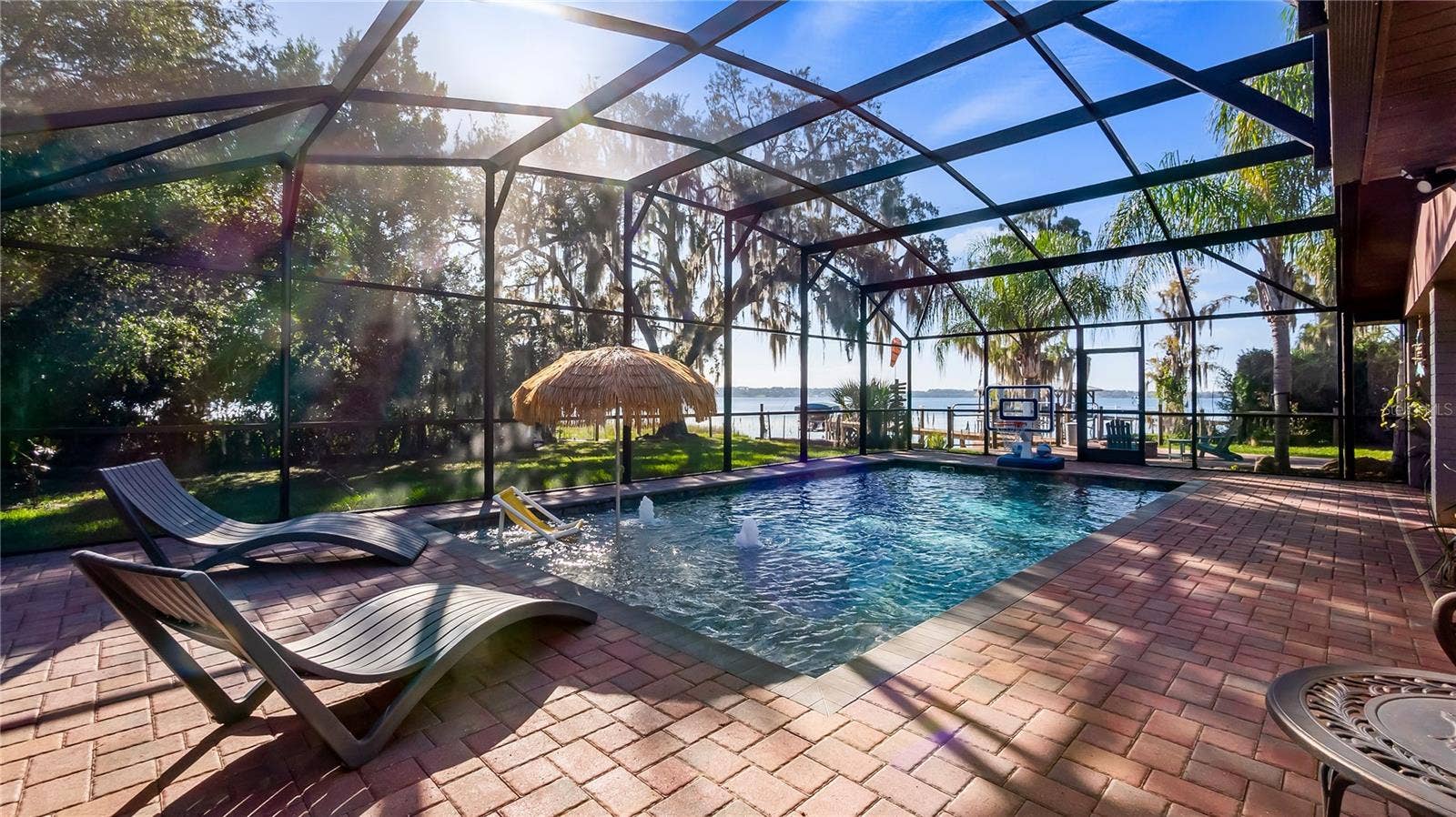 1730 NITA PLACE, Clermont, FL 34711 2 sets of sliders from great room to rear covered porch/pool added in 2023