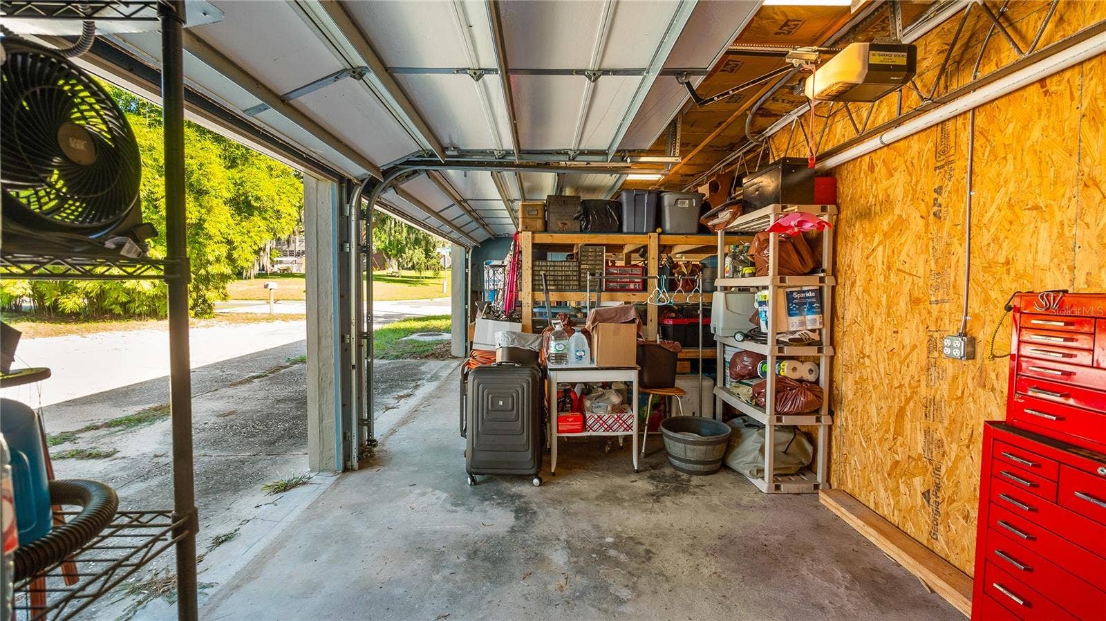 1730 NITA PLACE, Clermont, FL 34711 Detached garage and apartment. 2 car parking plus storage. Driveway off Lakeshore drive, little fenced in back yard. Full kitchen, laundry closet. remodeled. Pre wired for generator plug access so it can be run on a generator.