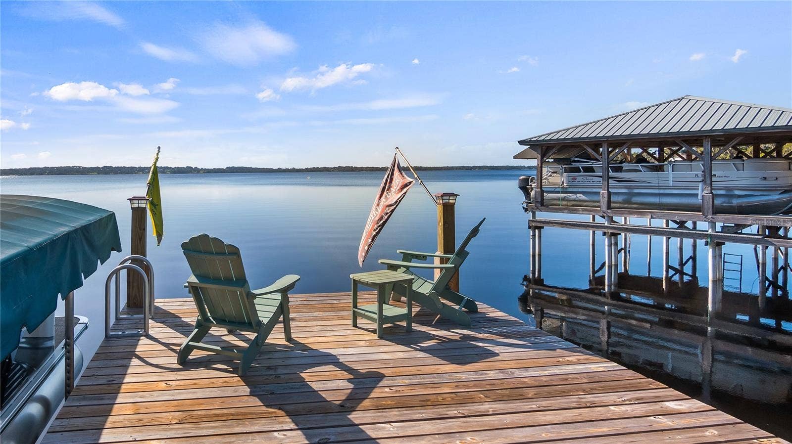 1730 NITA PLACE, Clermont, FL 34711 Resurfaced Seawall in 2026, Renovated Dock platform 10/2022, Renovated Dock walkway 5/2026