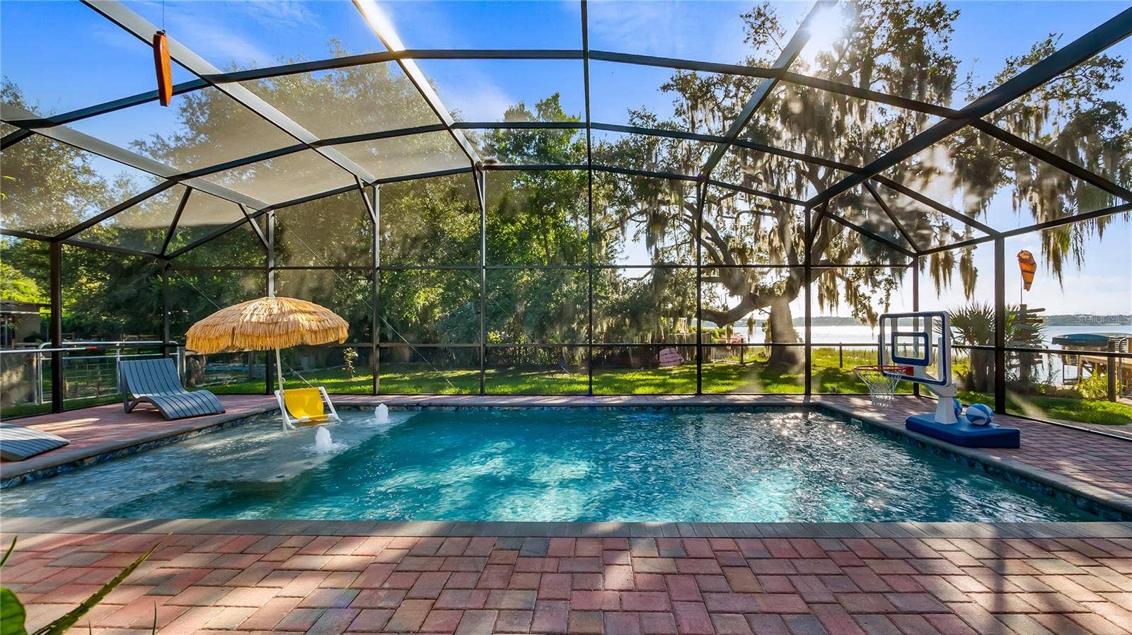 1730 NITA PLACE, Clermont, FL 34711 2 sets of sliders from great room to rear covered porch/pool added in 2023