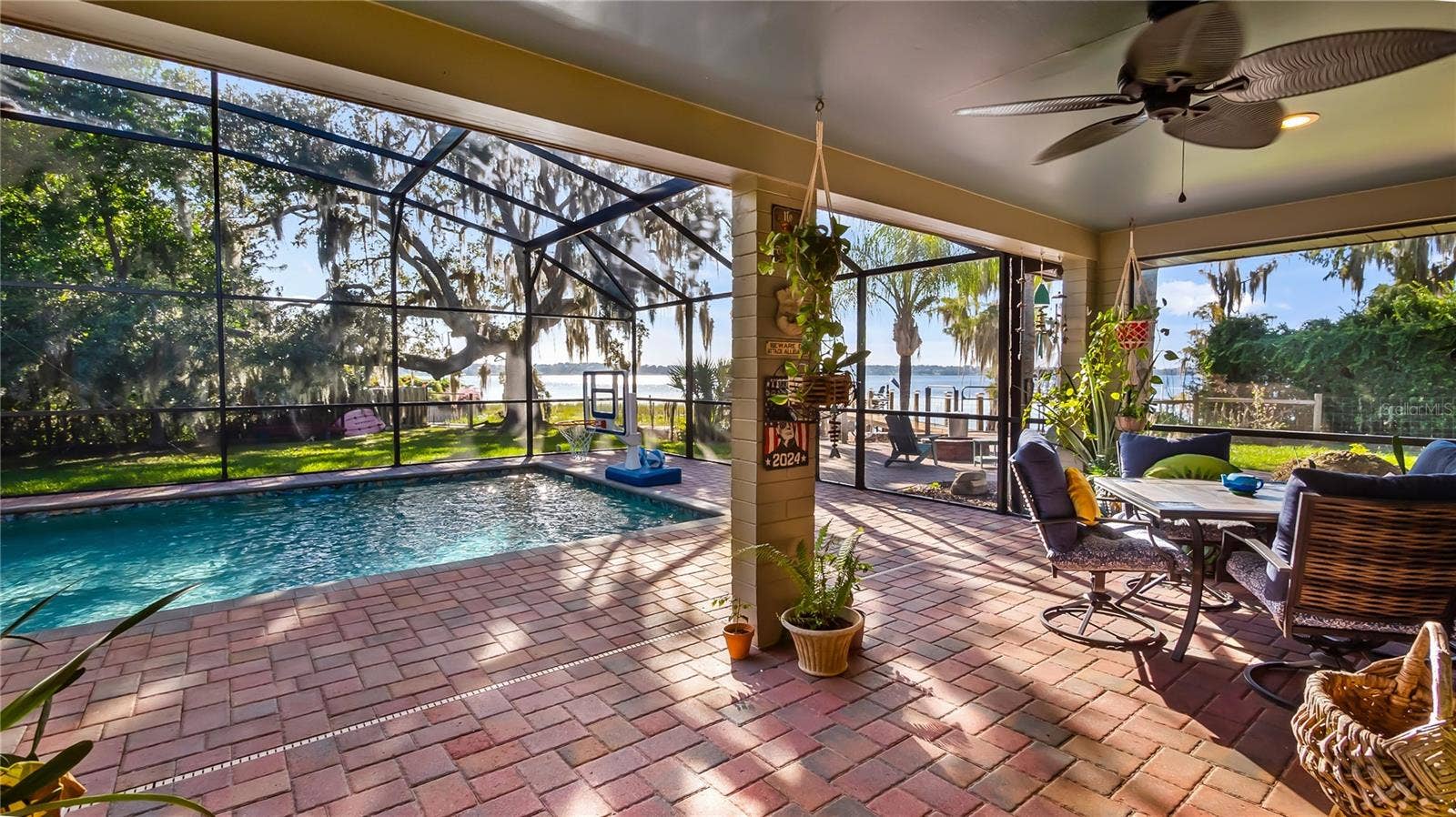 1730 NITA PLACE, Clermont, FL 34711 2 sets of sliders from great room to rear covered porch/pool added in 2023