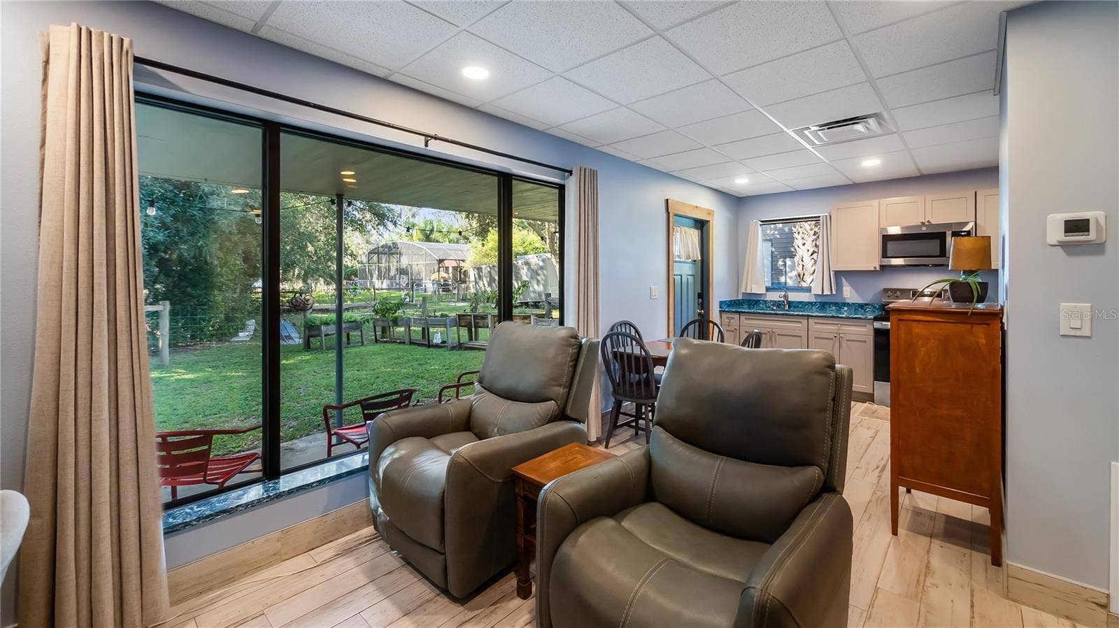 1730 NITA PLACE, Clermont, FL 34711 Detached garage and apartment. 2 car parking plus storage. Driveway off Lakeshore drive, little fenced in back yard. Full kitchen, laundry closet. remodeled. Pre wired for generator plug access so it can be run on a generator.