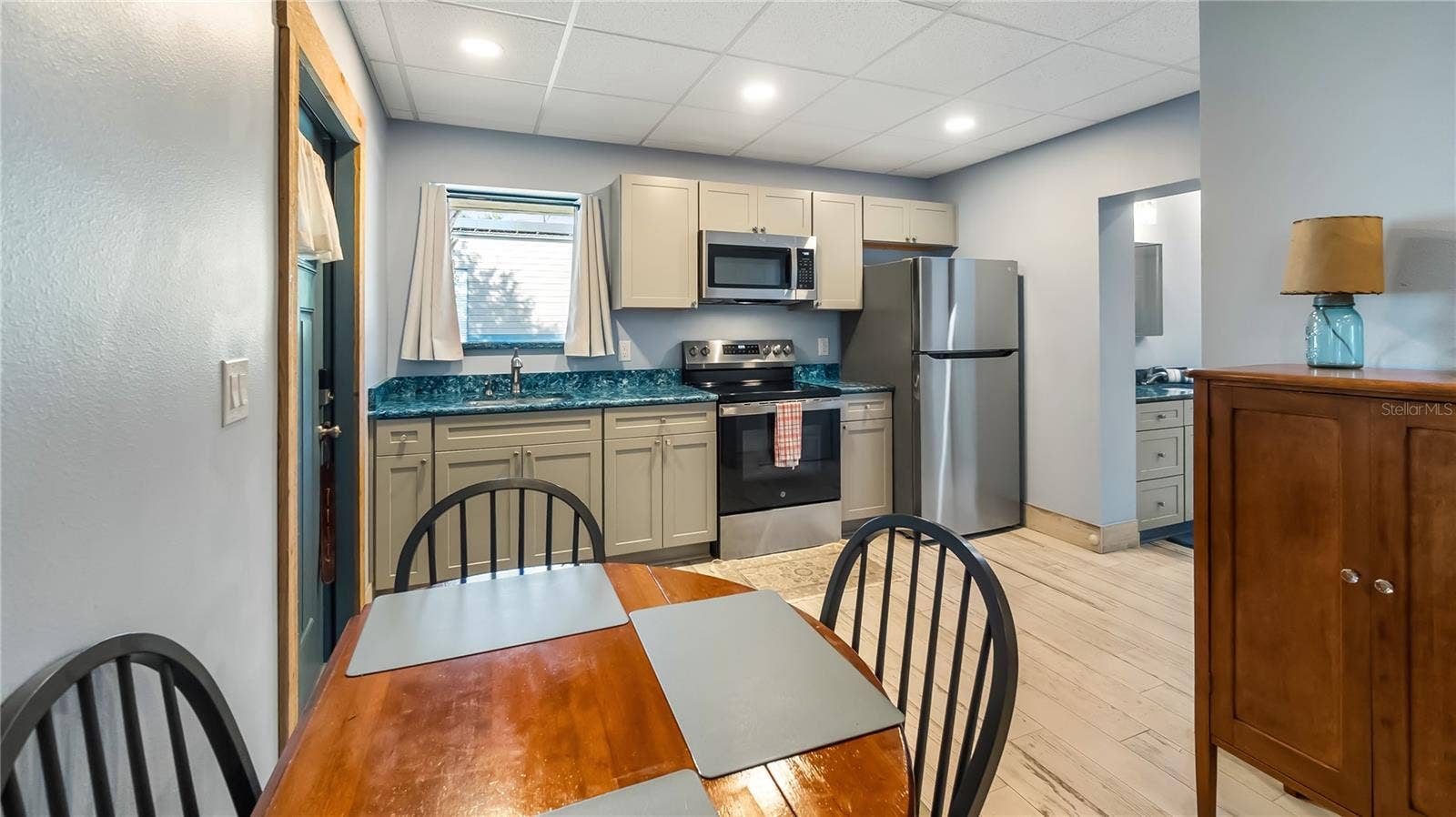 1730 NITA PLACE, Clermont, FL 34711 Detached garage and apartment. 2 car parking plus storage. Driveway off Lakeshore drive, little fenced in back yard. Full kitchen, laundry closet. remodeled. Pre wired for generator plug access so it can be run on a generator.