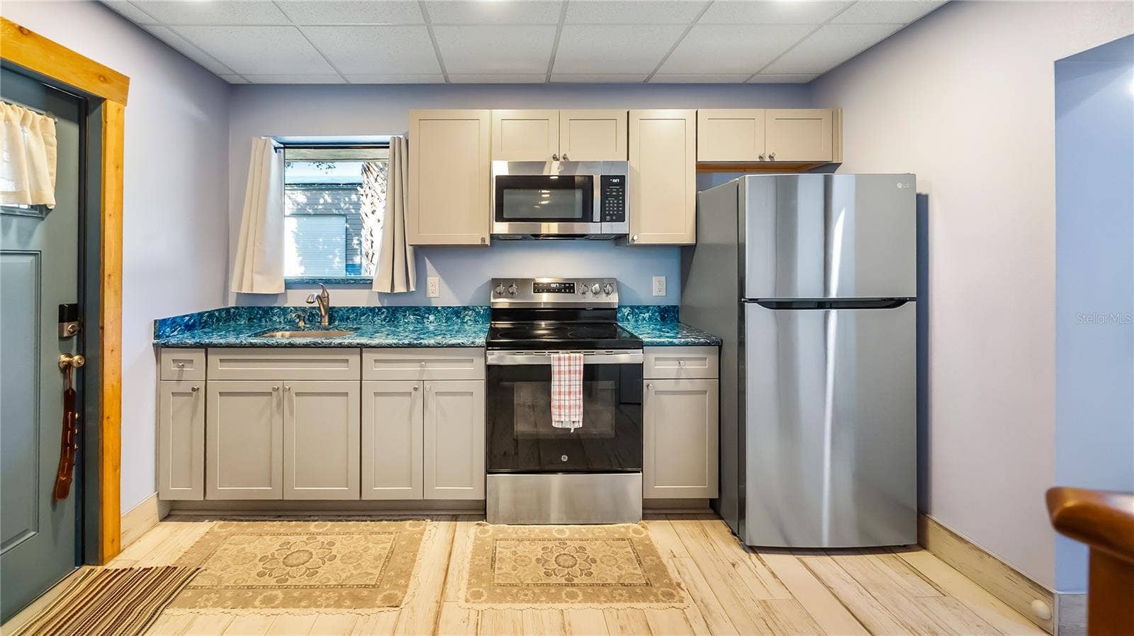1730 NITA PLACE, Clermont, FL 34711 Detached garage and apartment. 2 car parking plus storage. Driveway off Lakeshore drive, little fenced in back yard. Full kitchen, laundry closet. remodeled. Pre wired for generator plug access so it can be run on a generator.