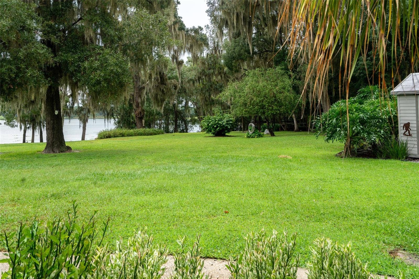 35935 NOLEN LANE, Eustis, FL 32736 Looking at west shore of lake front from side patio.