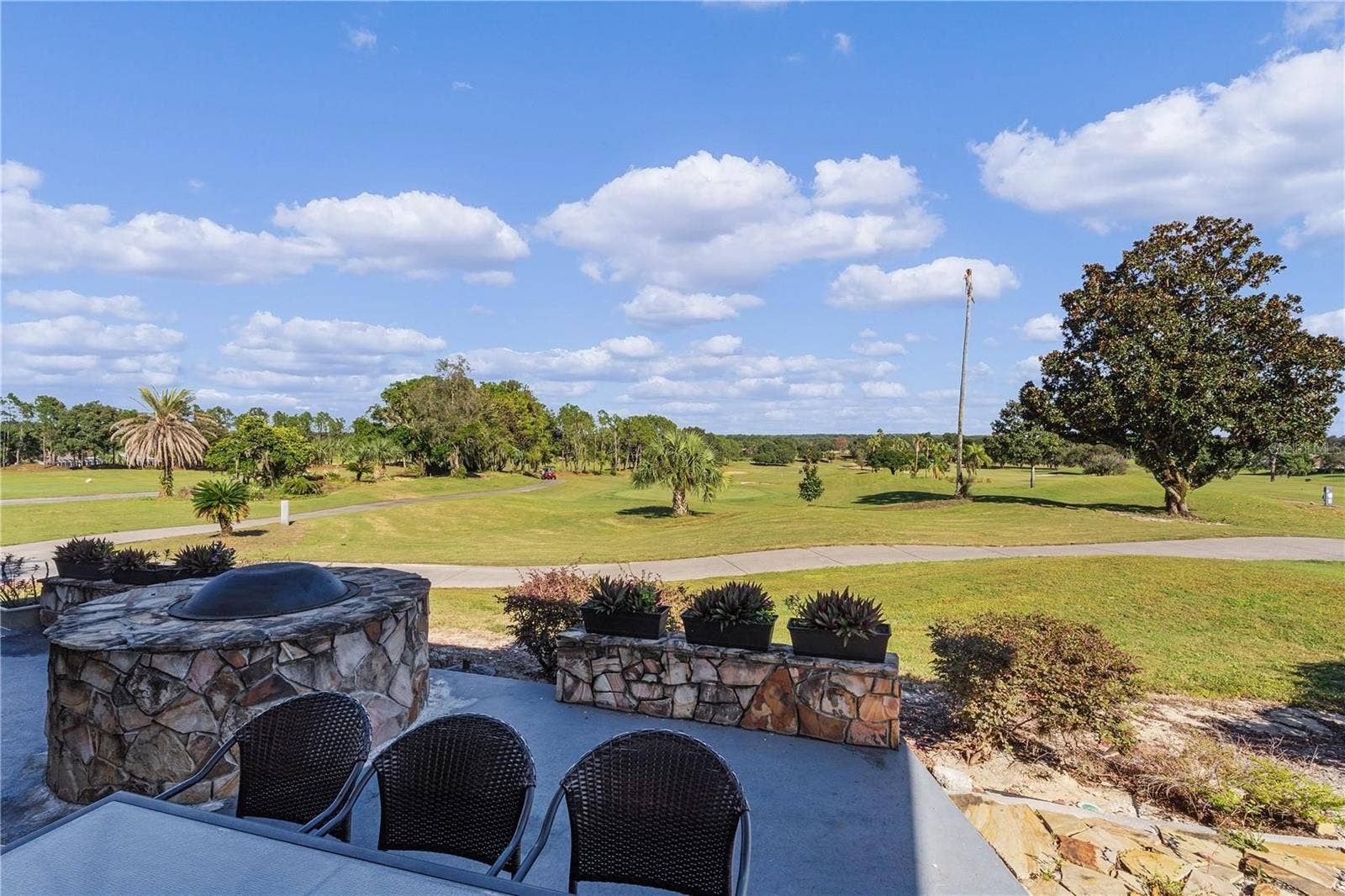 8724 SE 130TH LOOP, Summerfield, FL 34491 Patio At Liberty Grille