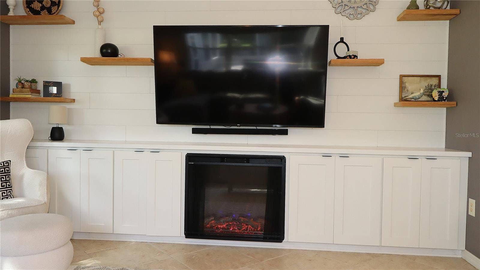 8724 SE 130TH LOOP, Summerfield, FL 34491 Living Room - Electric Fireplace w/Floating Shelves