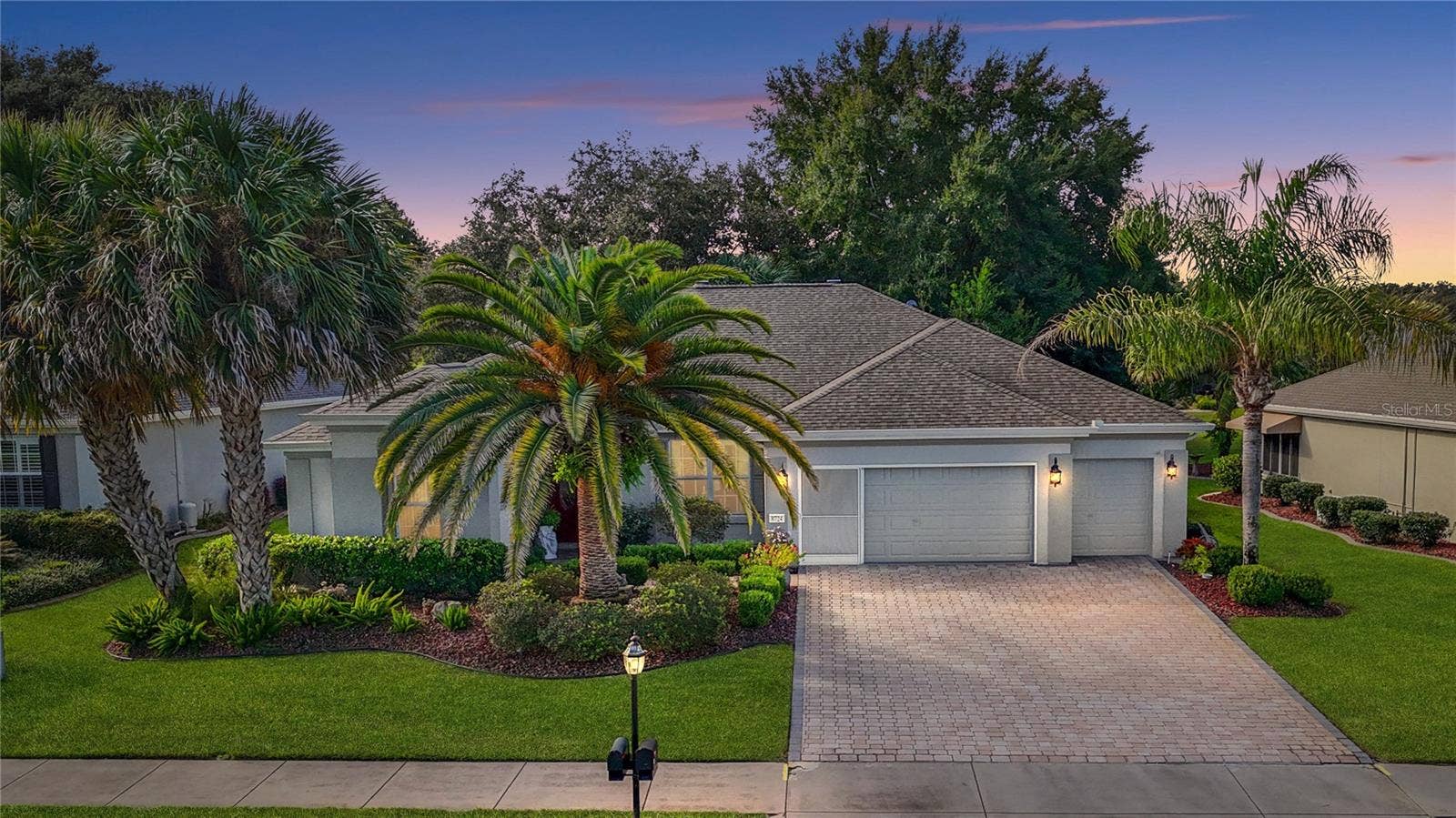 8724 SE 130TH LOOP, Summerfield, FL 34491 Twilight Front of Home