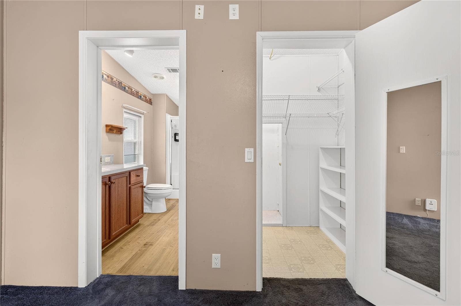 2722 VINDALE ROAD, Tavares, FL 32778 Primary bedroom walk-in closet & ensuite