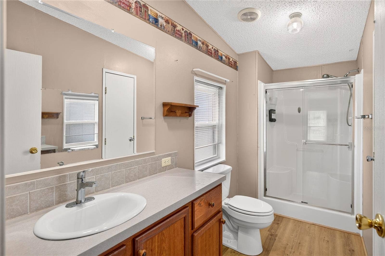 2722 VINDALE ROAD, Tavares, FL 32778 Primary ensuite bathroom