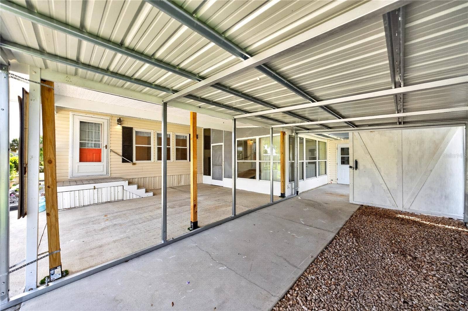 2722 VINDALE ROAD, Tavares, FL 32778 Extended carport+golf cart parking