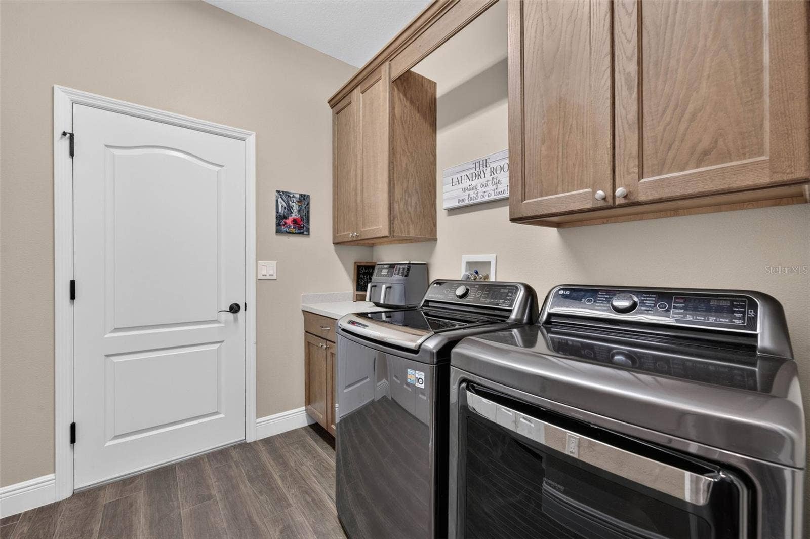 3749 ARLINGTON RIDGE BOULEVARD, Leesburg, FL 34748 Laundry/ Full-sized Pantry